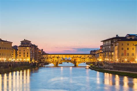 Ponte Vecchio Bridge At Night In Florence, Tuscany, Italy Stock Photo ...