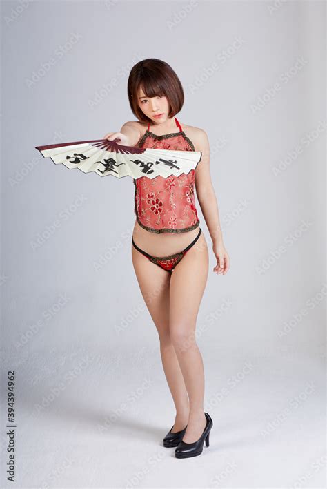 Sexy Chinese Girl In Bikini Dressed Carry A Pair Of Chinese Fans Dancing Sexy Acting In