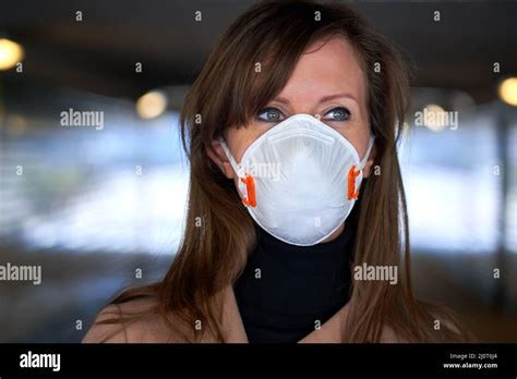 Coronavirus Disease Woman Wearing Face Mask In A Public To Protect