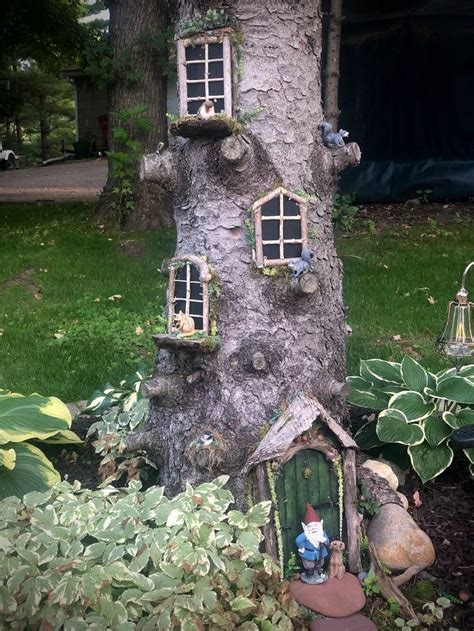 A Fairy House Built Into The Side Of A Tree