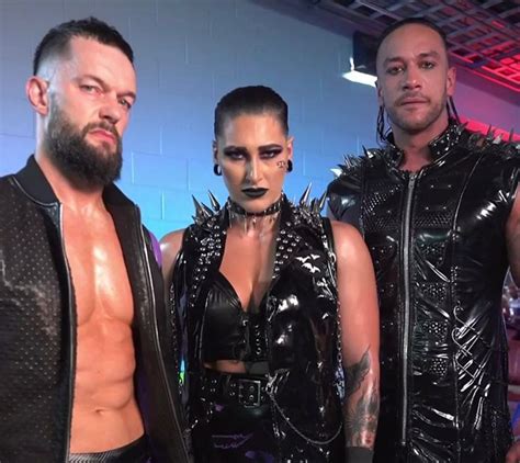 Finn Balór Rhea Ripley Damien Priest in 2023 Balor club Wrestling