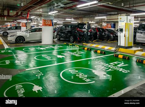 Electric vehicles charging points at Suntec City's car park in ...