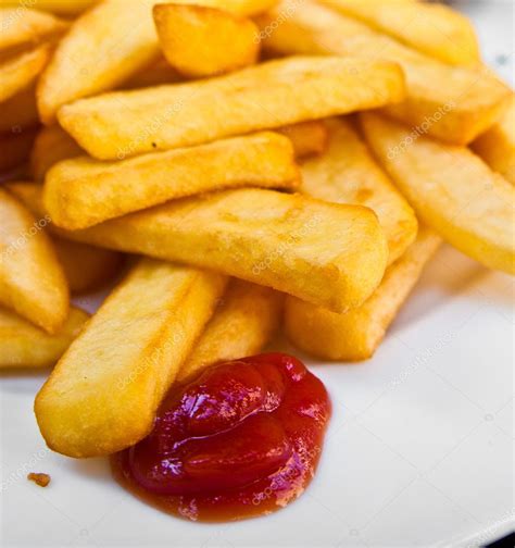 Golden French fries potatoes ready to be eaten — Stock Photo © ilolab ...