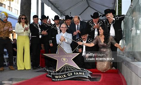 Members of Mexican band Los Huracanes del Norte pose for a photo... News Photo - Getty Images