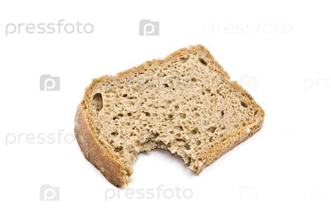 Фотография на тему Надкусанный кусок хлеба | PressFoto