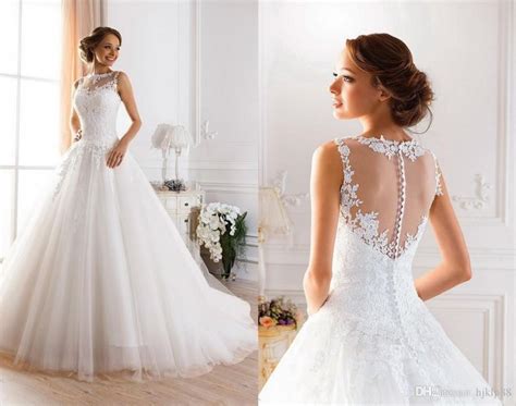 2015 Sexy Illusion Jewel Neckline A Line Sheer Wedding Dresses Beaded Lace Fluffy Backless