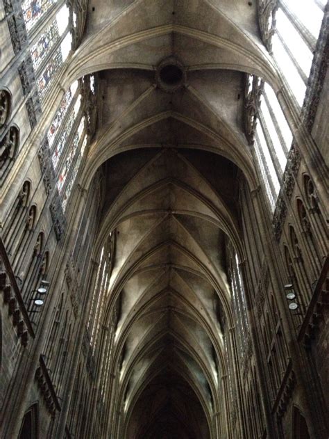 The Inside Of A Cathedral With Many Windows