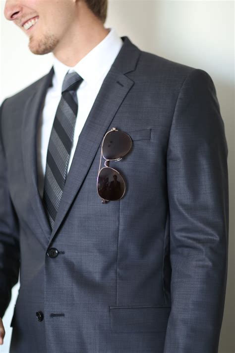 Charcoal Gray Suit With Striped Tie