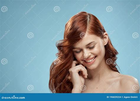 Beautiful Woman Curly Long Hair Smooth Hairstyle Naked Shoulders Cosmetics Care Blue Background