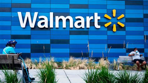 Download Walmarts New Logo Is Seen In The Background