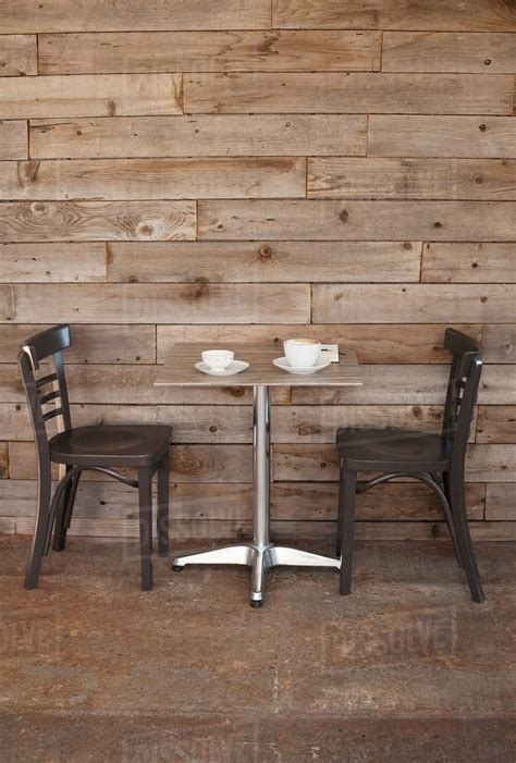 Cafe Table With Two Empty Chairs Stock Photo Dissolve