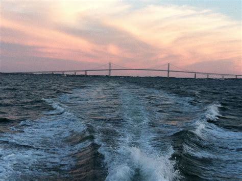 newport bridge sunset from the boat