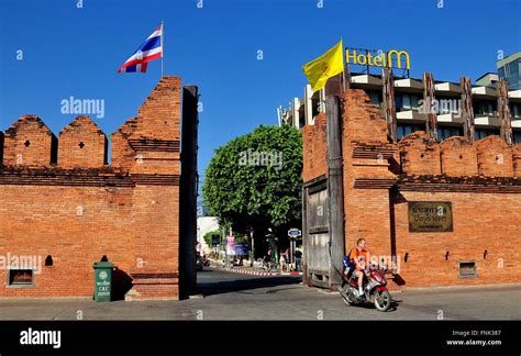 Chiang Mai Thailand A Motorcylist Driving Past The Tha Phae Gate And