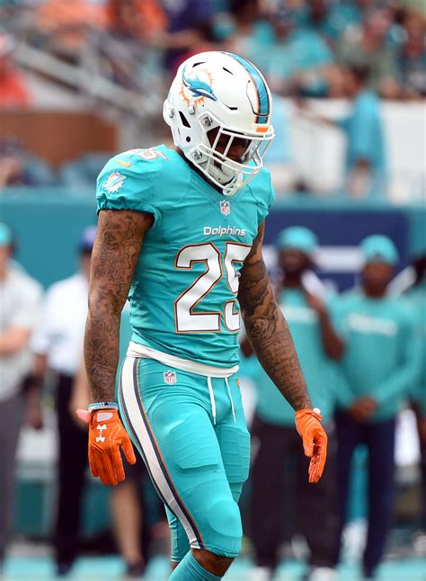 Download Miami Dolphins Gear Xavien Howard Wallpaper