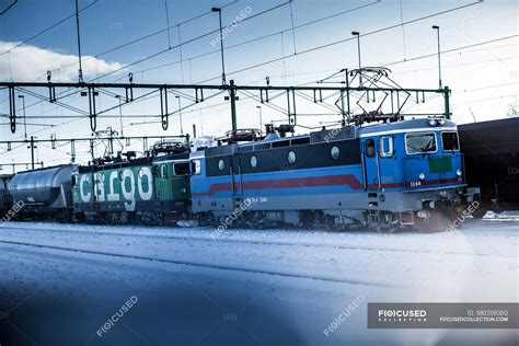 Train at railway station during winter — scandinavia, public transportation - Stock Photo ...