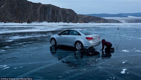 Dancing On Ice Stunning Pictures Show Chevrolet Car Driving Across Cracked Frozen Lake