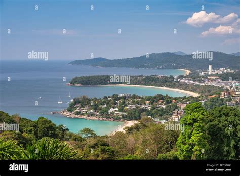 Tropical Islands View With Ocean Blue Sea Water And White Sand Beach At