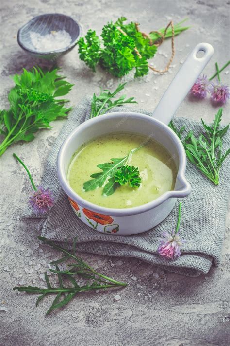 Premium Photo Healthy Homemade Green Herb Soup In Pot Made From Local