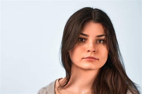 Premium Photo Portrait Of Beautiful Naturally Brunette Woman Smiling And Looking Confident In