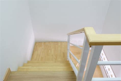 Modern Curved Wooden Staircase with the White Metal Handrail Stock Image - Image of home ...