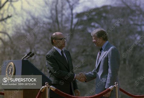 Jimmy Carter And Menachem Begin Shake Hands During A Welcoming Ceremony