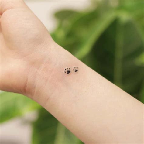 Small Paw Print Tattoo Ideas For Females Elegant And Meaningful Designs