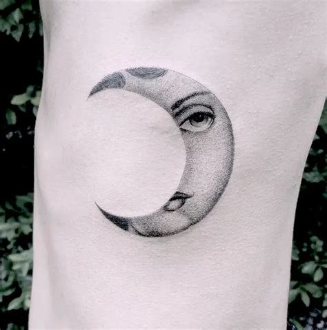 Small Moon Face Tattoo: 10 Adorable Designs to Inspire Your Next Ink!