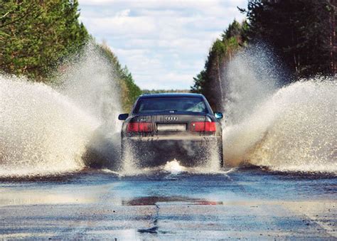 Driving Through Deep Water Dangers Wet Brakes Flood Safety Rules