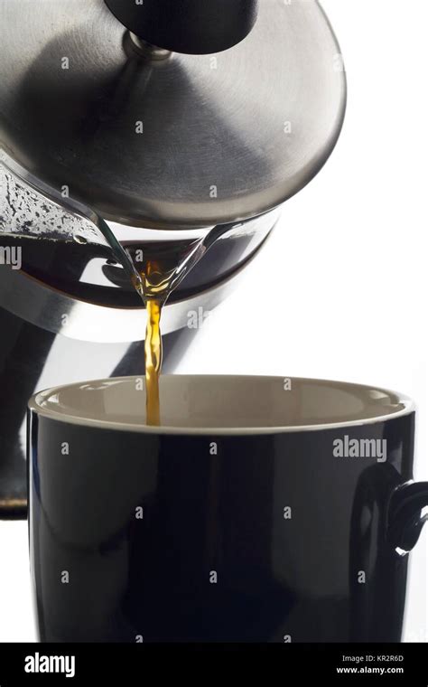 Pouring Coffee In Mug Stock Photo Alamy