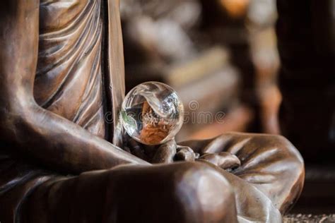 Amazing Crystal Ball In Hands Of Monk Statue Stock Image Image Of