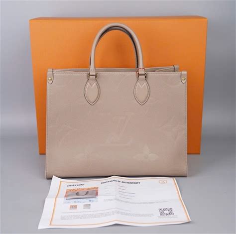 Túi LV onthego da bê màu nude sz34