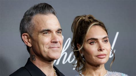 Robbie Williams Poses In His Underwear As He Joins Forces With Wife