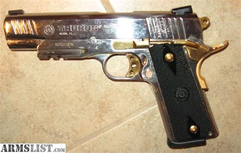 ARMSLIST For Sale 45 CAL STAINLESS GOLD TAURUS PT 1911 AR