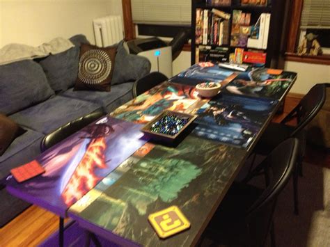 Table In Game Room Set Up For Mtg With Playmats Dice Coasters Etc