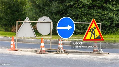 Road Signsroad Works With Trucks And Traffic Signsroad Works Road ...