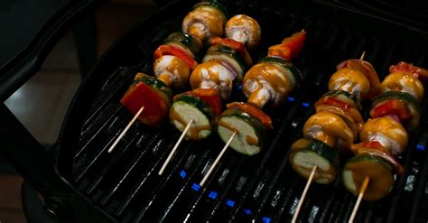 Skewers with tasty vegetables on grill · Free Stock Photo