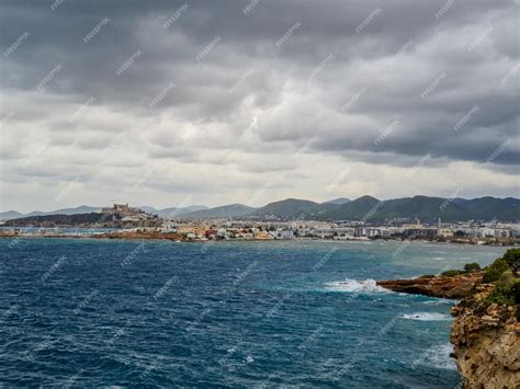 Premium Photo | Rain clouds over ibiza