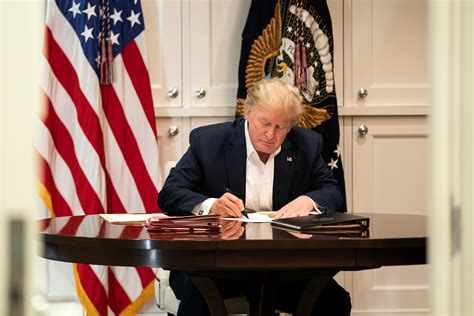 White House Releases Photos Of Trump Working While In Hospital