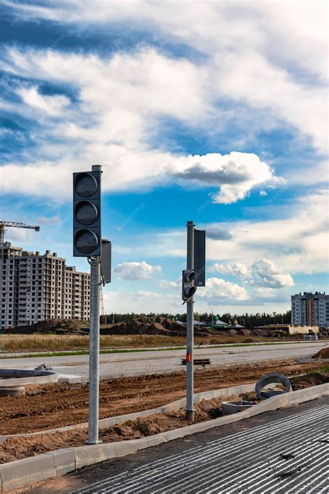 Premium Photo | Installation of group traffic lights during the ...