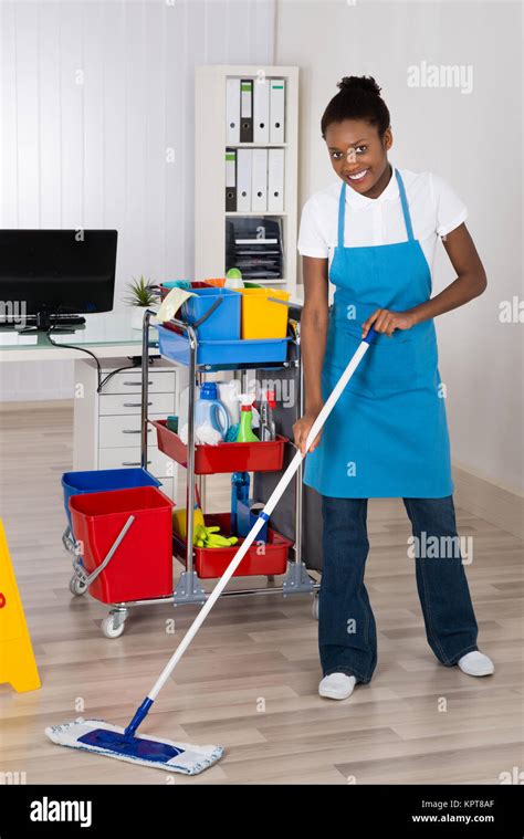 black woman floor office cleaning  res stock photography  images