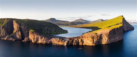 Sorvagsvatn Lake On Cliffs Of Vagar Island In Sunset Faroe Islands