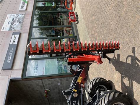 Taille haie sécateur pour chargeur euro et Schmetz SA