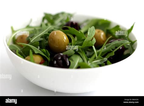 Olive and Rocket Leaf Salad Stock Photo - Alamy