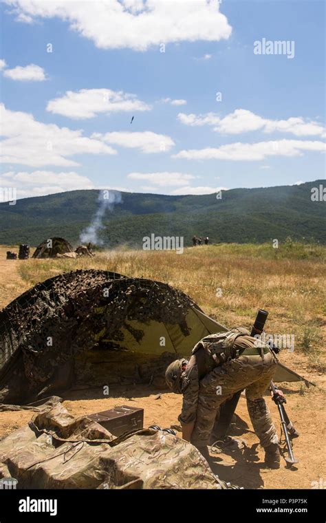 Royal Marine Commandos Fire High Explosive Rounds From 81mm Mortar