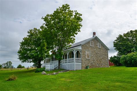 Circa 1832 Historic Stone Farmhouse For Sale W Outbuildings And River