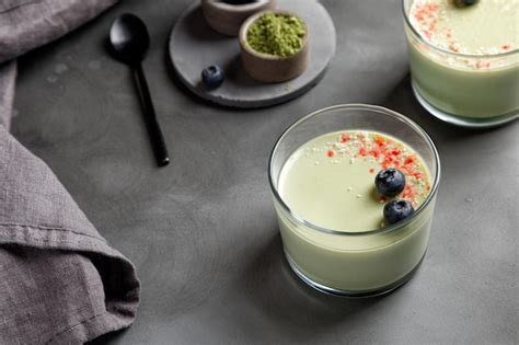 Premium Photo Two Matcha Tea Panna Cotta Desserts With Decor With