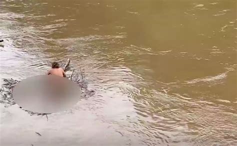 Why Is This Man Naked And Floating Down The River On Logs Free Beer And Hot Wings