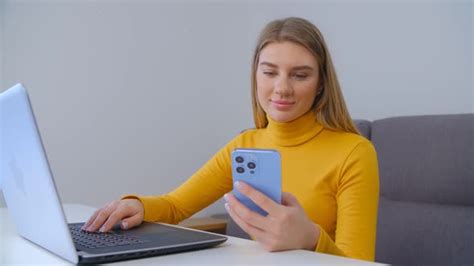 Yooung Adult Blonde Woman Using Mobile Phone With Cheerful Smile In K Video Clip Stock Footage