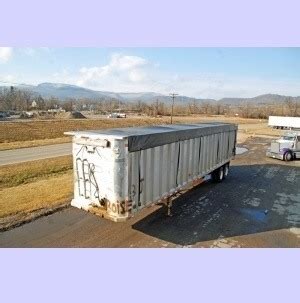 Mountain Tarp | Ratchet Side Roll and Lock-N-Roll Systems for Open Top Trailers up to 55' - TarpGuy