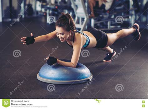 Exercising on bosu ball stock image. Image of pursuit - 71213967 